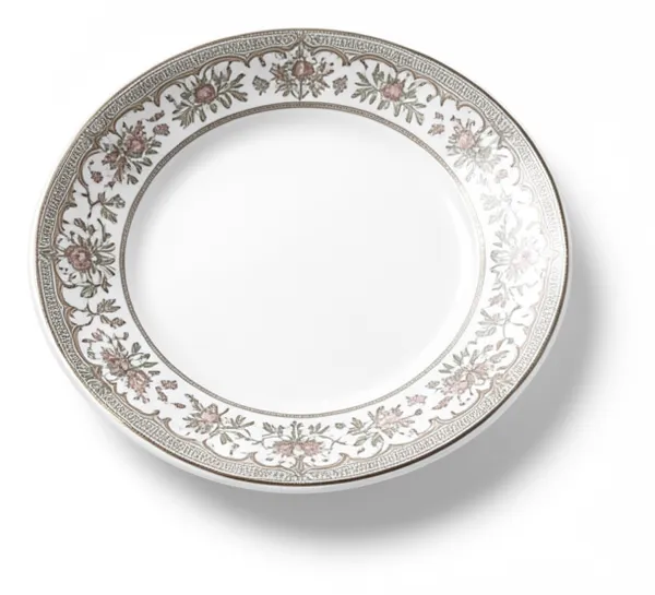 An ornate patterned plate with nothing on it, looking different without tasting different.